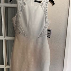 A brand new beige guess dress